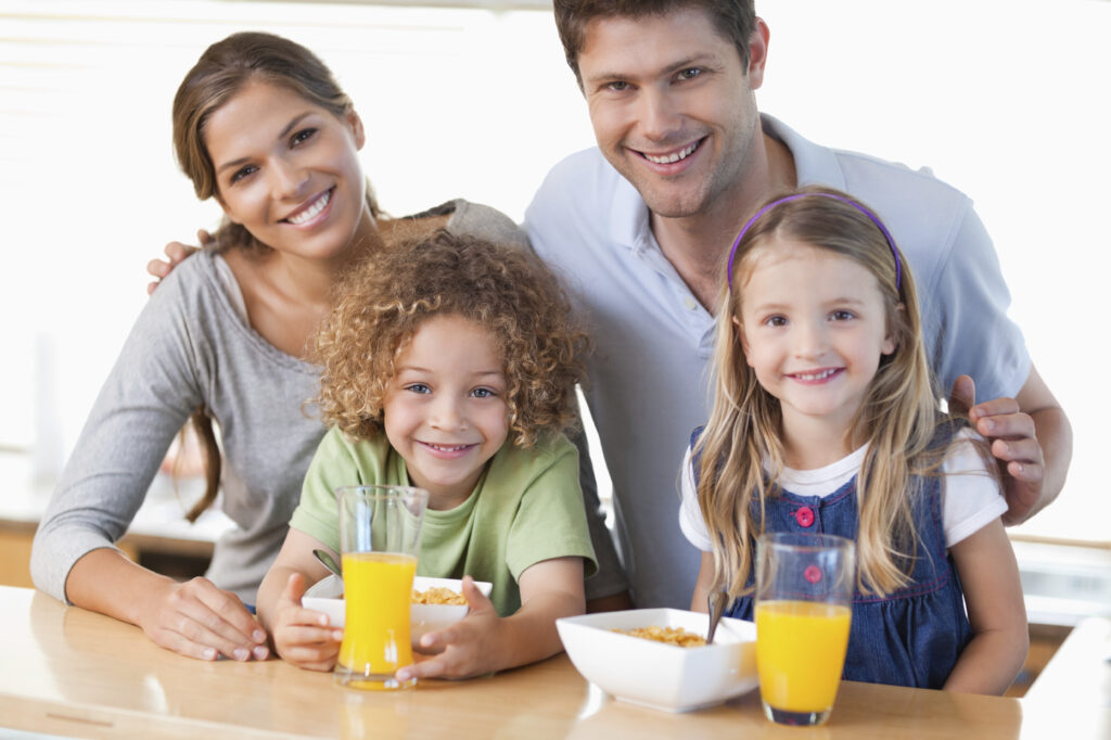 Happy Family Having Breakfast