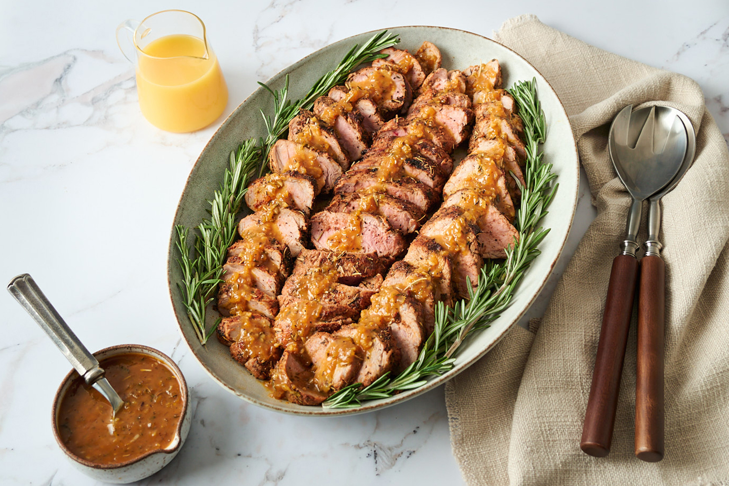 Rosemary Dijon Pork Tenderloin With Florida Orange Juice Sauce