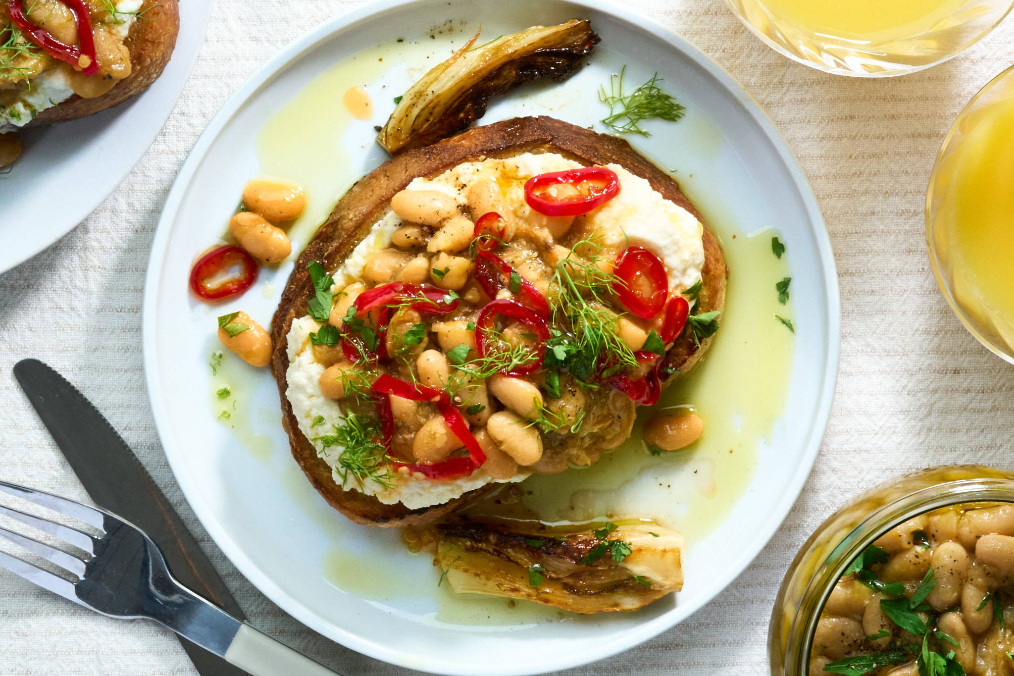 Bean Salad With Florida Orange Juice, Fennel & Chili On Ricotta Toast